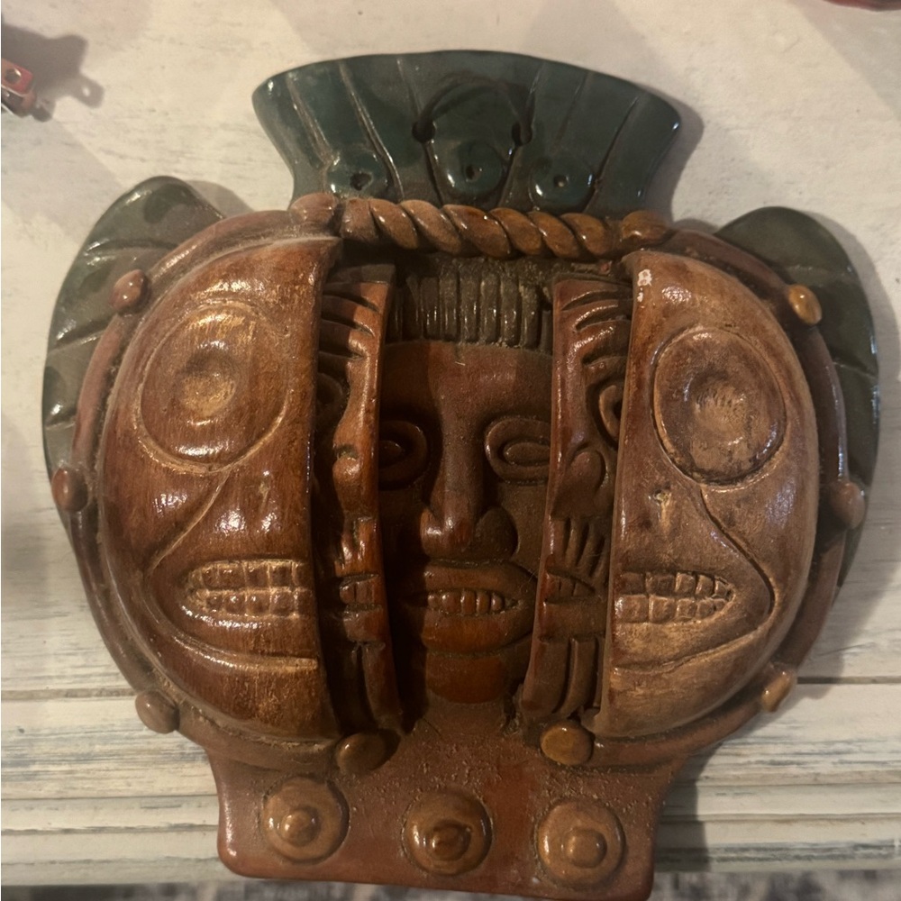 Aztec or Mayan
"three ages of man" clay mask wall sculpture.